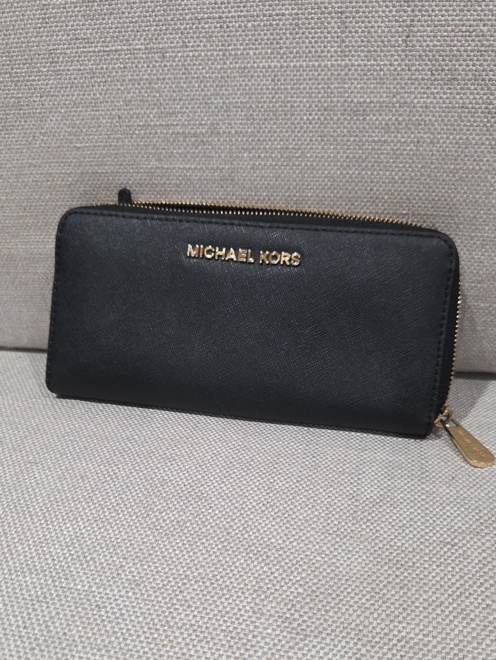 Michael Kors Jet Set Travel Black Zip-Around Leather Wallet with Gold Logo